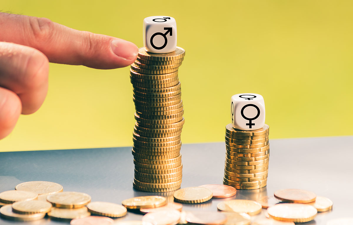 gender wage gap shown with coins